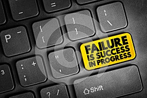Failure Is Success In Progress text button on keyword, concept background
