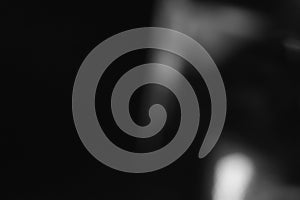 Faint light reflection emerging through deep shadow