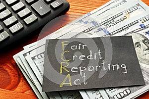 Fair Credit Reporting Act FCRA is shown on the business photo using the text