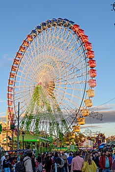 Fair ferris wheel at sunset