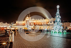 Fair in KRAKOW. Main Market Square and Sukiennice in the evening