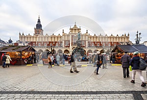 Fair in KRAKOW. Main Market Square and Sukiennice in the evening.