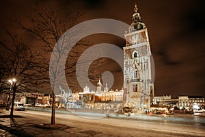 Fair in KRAKOW. Main Market Square and Sukiennice in the evening.