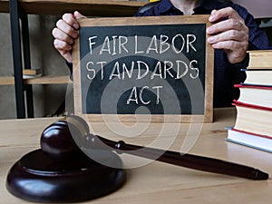 Fair Labor Standards Act is shown on the conceptual business photo