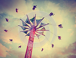 A fair ride shot with a long exposure at dusk toned with a retr photo