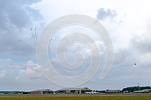 FAIRFORD, UK, JULY 13 2018: A photograph documenting athe Patrulla Aguila from the Spanish Air Force displaying their aerobatic C photo