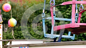 Fairground chair swing ride at fun fair