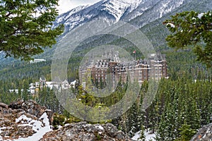 Fairmont Banff Springs in snowy autumn sunny day. Banff National Park, Canadian Rockies.