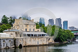 Fairmount Waterworks, and the skyline in fog, in Philadelphia, Pennsylvania