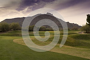 Fairway of beautiful Arizona golf course mountain backdrop