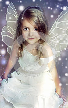 Fairy angel child with wings.