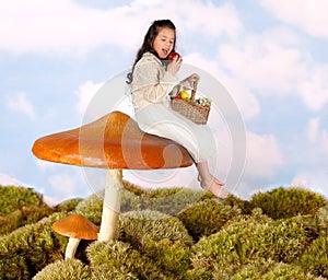 Fairy child on a toadstool