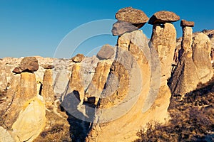 Fairy Chimneys in Cappadocia - picturesque extraordinary naturally formed rock formations with the unique shapes