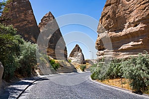 Fairy Chimneys. Fairy chimneys and road in the Goreme Cappadocia Turkey