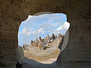 Fairy Chimneys through Stone Window