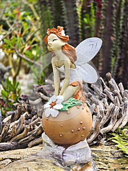 Fairy, Close up shot of elf statue in the forest.