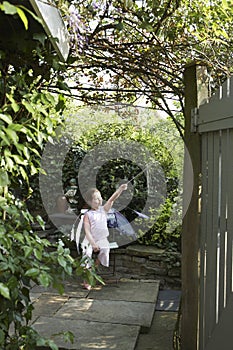 Fairy Girl Holding Out Magicwand At Garden