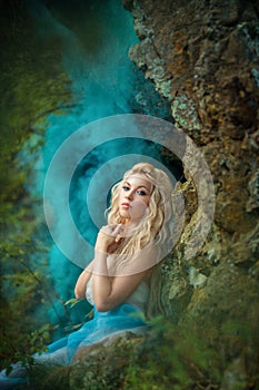 Fairy girl on the rock