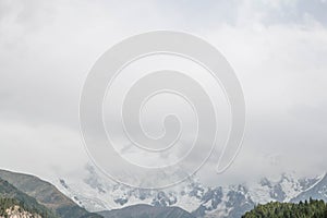 Fairy Meadows Nanga Parbat mountains covered in fog in Gilgit-Baltistan, Pakistan