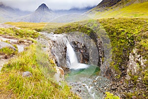 Fairy Pools footpath with waterfall Skye island Scotland