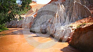 Fairy Stream Suoi Tien, the travel place in Muine, Vietnam, panning camera tracking shot, High quality in HD