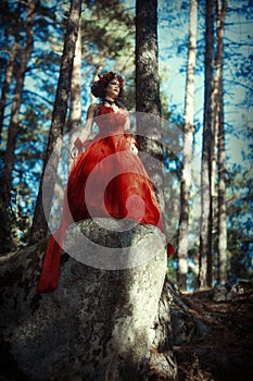 Fairy-tale image of a girl in the forest