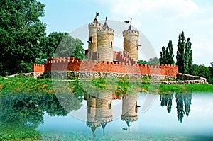 Fairy-tale like dreamy castle medieval red brick kids playground photo