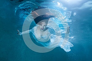 Fairy woman under water.