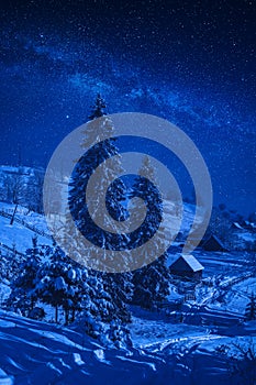 Fairytale carpathian winter village at night