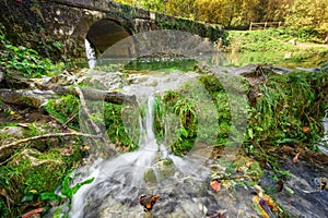 Fairytale by the river beautiful cascades and an old bridge in Orbaneja del Castillo, Burgos, Spain.