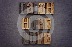 Faith, Hope, Love Spelled out in Type Set
