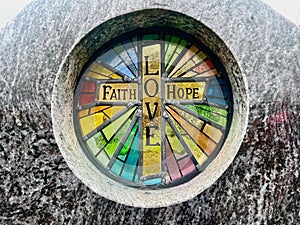 Faith, Hope and Love stained glass circular glass