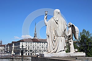 Faith Statue with the Holy Graal and Mole Antonelliana taken from the Gran Madre di Dio, Italy.