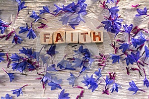 Faith on the wooden cubes