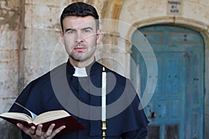 Faithful man praying close up