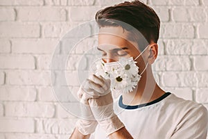 Faithful religious man praying to God for help with COVID-19