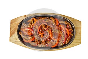 Fajita with meat on frying pan isolated