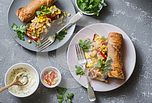 Fajita sandwich. Chicken fajitas spicy grilled baguette on a gray background, top view