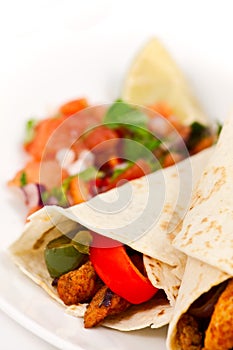 Fajita wraps with peppers and salsa