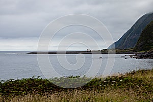 Fajã da Caldeira de Santo Cristo, a small inhabited headland on the island of Sao Jorge, Azores