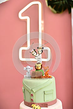 Fake cake with safari motifs and 1 year old candle