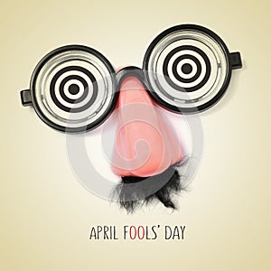 Fake eyeglasses and text april fools day, with a retro effect