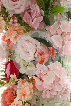 Fake flowers decorate the interior of a hotel