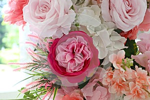 Fake flowers decorate the interior of a hotel