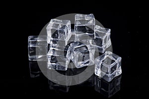 Fake ice cube isolated on black