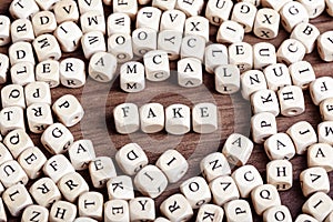 Fake, letter dices word