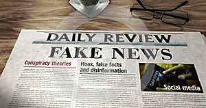 Fake news and disinformation newspaper on table