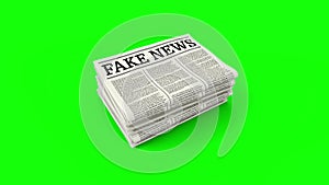 Fake news - Fake news headline. Hoax media newspaper printing. Stack of newspapers on green background.