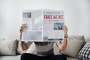 Fake news headline on a newspaper photo