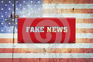 Fake news. The inscription on a red plate on the background of the flag of America. Information